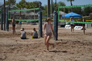 Beach volleyball blonde looking sexy and showing her body off