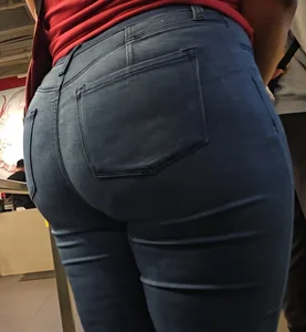 Thick ebony booty in tight jeans.