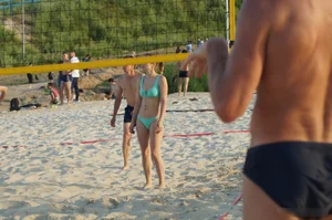 Girl in Green Swimsuit with Hot Body Playing Volleyball on the Beach Candid Gallery