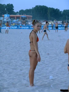 A bunch of sexy beach voyeur babes in bikinis, thongs and topless
