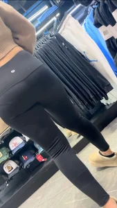 latina with a nice butt in leggings capped in mall