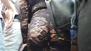 Girl in incredible see through body suit showing her ass and thong