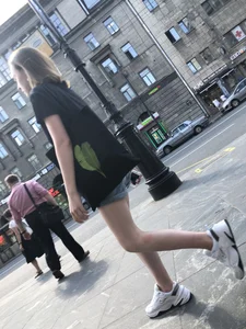 Candid Teen in Denim Shorts And Sneakers With Slim Legs Street Photos