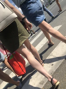 Hot girl in short dresses and skirts on the crosswalk street creepshots