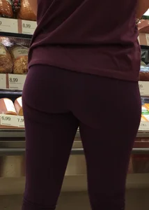 Blonde bubble butt babe shopping in tight purple leggings