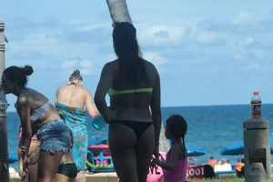 More sexy girls in bikinis and thongs at Deerfield Beach in Florida