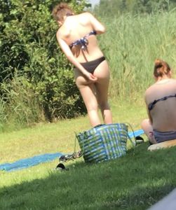 Sexy teen on the beach changing