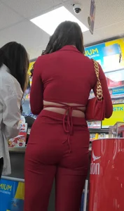 Hot minx in a stunning red outfit
