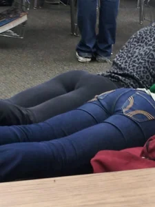Flat Booties in Tight Jeans - College Girls Lying on the Classroom Floor Candid Photo