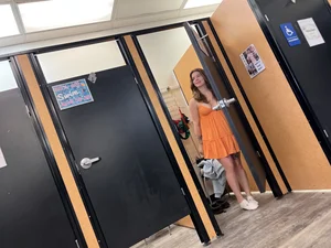 Two college babes trying on outfits
