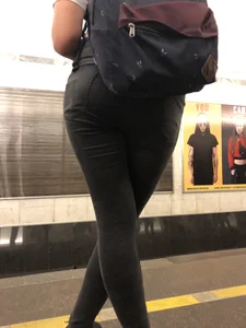 Girl with Hot Booty in Tight Jeans Standing with Her Legs Crossed - Subway Creepshot