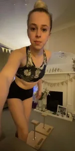 Skinny gymnast girl training at home