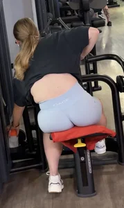 Hot blonde in gym just to show off her tight ass in blue shorts