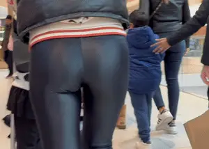 Skinny Milf in glossy leggings