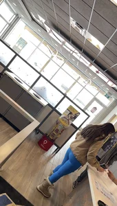 Hot babe ordering food in bright blue leggings