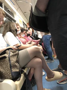 Cute Teen Girl With Hot Crossed Legs in Tight Shorts And Slippers Subway Creepshots