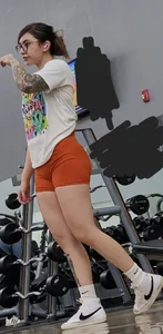Tattooed PAWG showing cakes in tight shorts