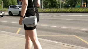 Candid girl in a short dress street video