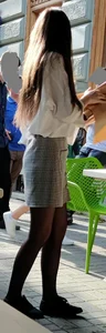 Slim Girl in a Blouse, Skier And Black Pantyhose With Thin Legs Street Creepshot