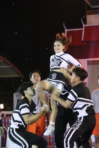 Bunch of athletic Thai cheerleaders at a competition