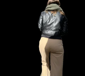 Candid girl in a leather jacket and pants with VPL street creepshots