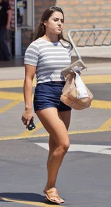 Hot brunette with a great ass in tight denim shorts