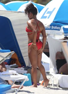 Christina Milian in red bikini in Miami with hard nipples