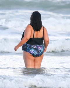 Extra thick girl at the beach in a bikini