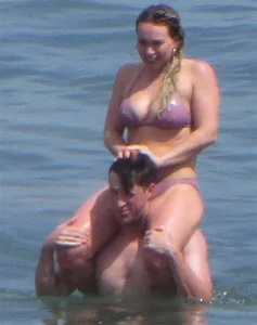 Hilary Duff in purple bikini in Malibu with a great ass and hard nipples