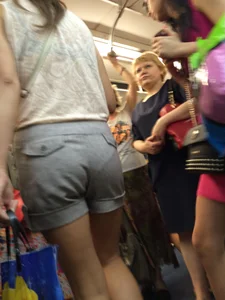 Milf in Shorts Subway Creepshot Closeup