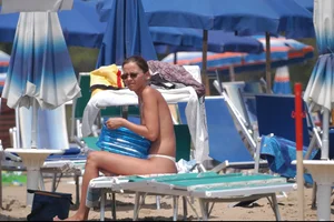 Girls on a nude beach in Bibione, Italy