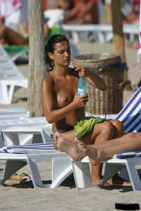 Beach voyeur girls in bikinis, thongs and topless