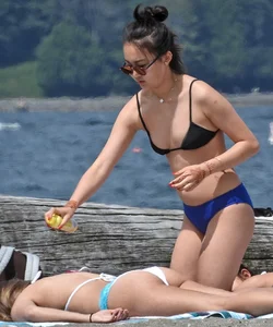 Blondie and two asian girls put on sunscreen (pt 2) [062]