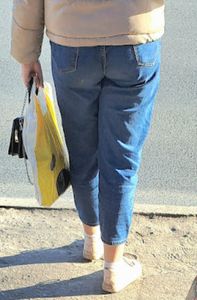 Nice ass in blue jeans on the street, blonde candid milf waiting for a bus