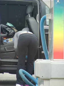 Girls cleaning their cars in jeans and pants