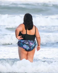 Extra thick girl at the beach in a bikini