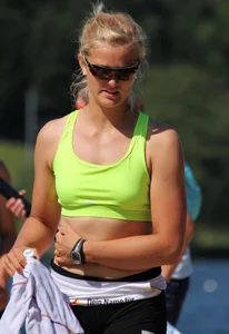 Sexy row girls in tight tops and spandex shorts