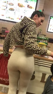 Brunette babe with a great ass in tight grey leggings