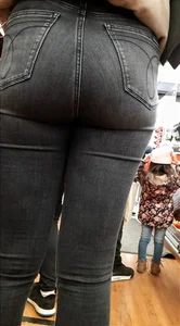 Teen in tight jeans shopping