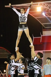 Bunch of athletic Thai cheerleaders at a competition