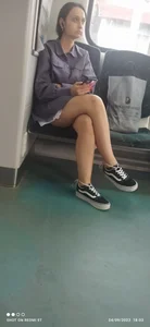 Cute candid girl with nice legs sitting with crossed legs in a public bus creepshots