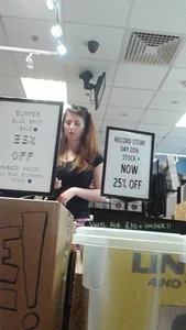 Girl at the record store in shorts with a nice booty and vpl