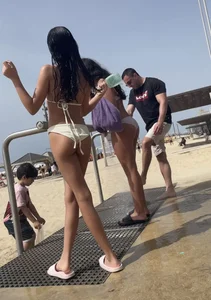 Skinny girl in a swimsuit at the beach