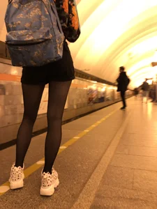 Skinny Girl in a Skirt and Black Pantyhose Subway Candid