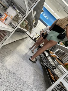 White chick with cheeks hanging out of green shorts