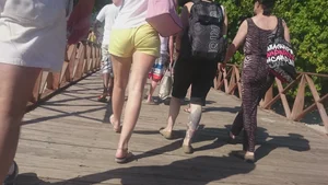 Milf in yellow shorts with vpl and a wedgie