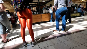 Amazing ass in really tight orange spandex