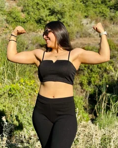 Hot non-candid girl wearing a top and leggings