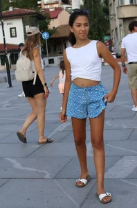 Skinny girl wearing shorts on the street