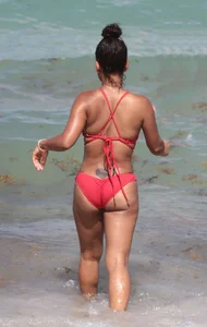 Christina Milian in red bikini in Miami with hard nipples